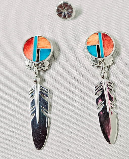 Photo of inlayed earrings by Ray Tracey