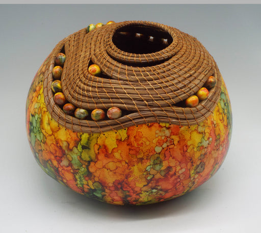 Photo of carved and painted gourd by Judy Richie