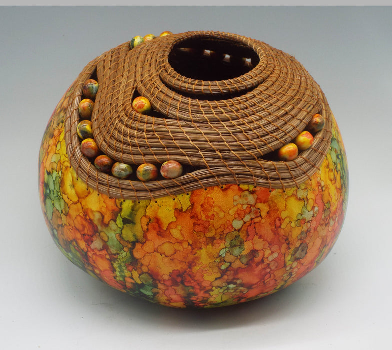 Photo of carved and painted gourd by Judy Richie