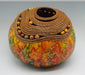 Photo of carved and painted gourd by Judy Richie