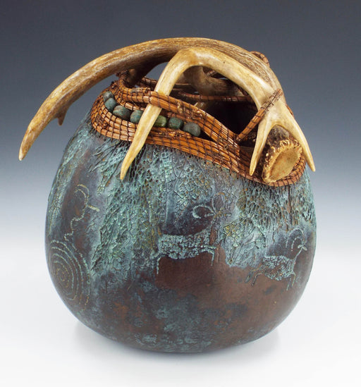 Photo of carved and painted gourd by Judy Richie
