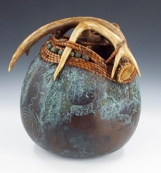 Photo of carved and painted gourd by Judy Richie