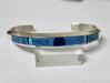 Photo of inlay jewelry by Wayne Muskett