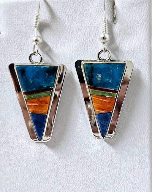 Silver and inlayed stone jewelry by Wayne Muskett