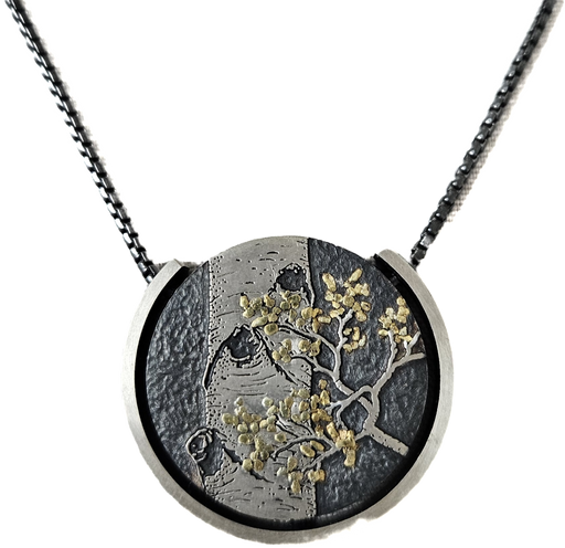 Photo of gold and silver necklace by Wolfgang Vaatz